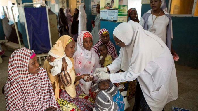 Trained-health-workers-attending-patients-at-a-health-facility.jpg